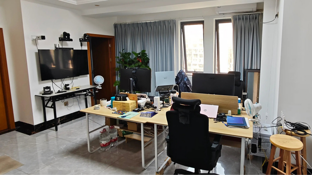 Simitie global solutions desk and technical support office in Nanning, equipped with PTZ cameras and optical focus charts for agile client testing